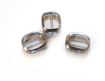 Glasperle mit silbernem Rand